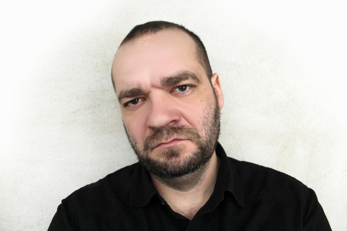Scowling man Scowling man