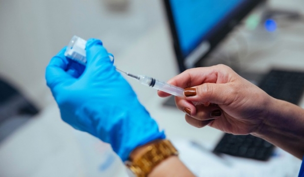 Story of the Week: Vaccine Rollout Expands As Cases Fall